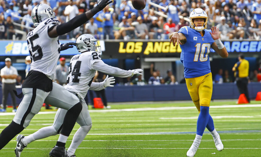 Derek Carr of Raiders falls to Justin Herbert and Chargers