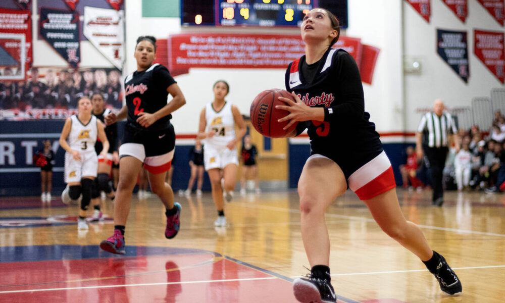 Liberty rolls past Clark in girls basketball — PHOTOS