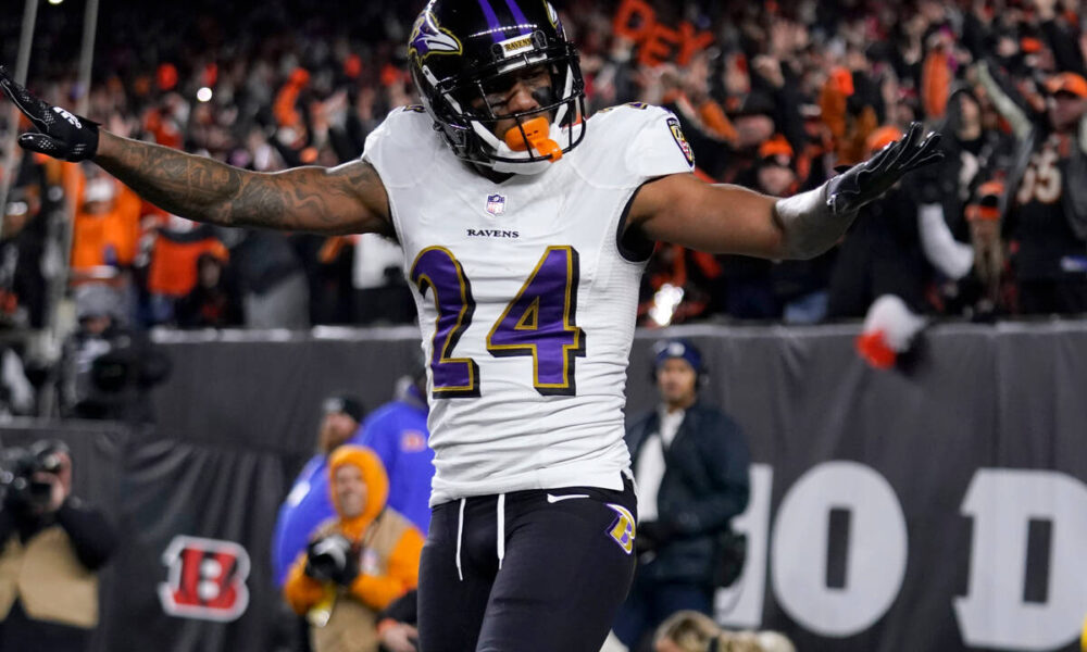 Marcus Peters visits with Raiders on Monday