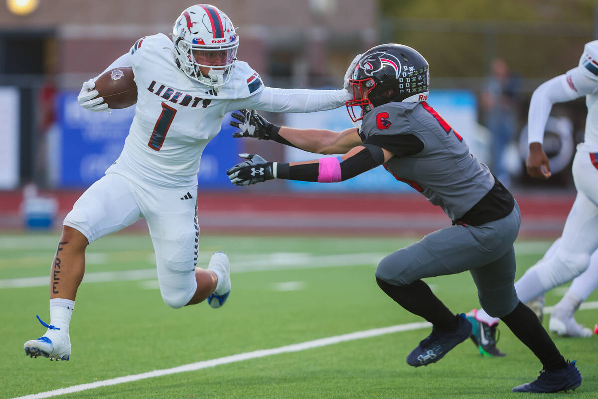 Liberty RB Ezra Sanelivi gets college football offer from Washington, Wisconsin